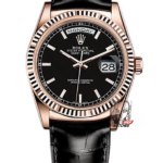 Rolex Day-Date Series 118135, Black Dial Gold Case with a leather strap, 36mm size.