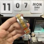 Rolex Datejust series m126333-0006, two-tone gold case black dial with diamond markers and a five-link two-tone gold bracelet, 41mm size. - 图片 11