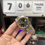 Rolex Datejust series m126333-0006, two-tone gold case black dial with diamond markers and a five-link two-tone gold bracelet, 41mm size. - 图片 3