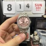 Rolex Datejust Series m126234-0031, Pink Dial Roman Numeral Markers Diamond Bezel, 36mm Size.