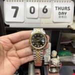 Rolex Datejust series m126333-0006, two-tone gold case black dial with diamond markers and a five-link two-tone gold bracelet, 41mm size. - 图片 2